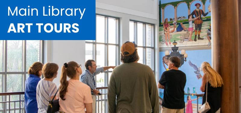Main Library Art Tours. Photo shows a small group on tour with a volunteer docent. He is pointing out a mural on the wall.