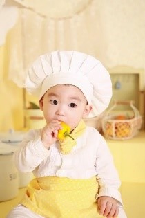 Baby in a chef's hat
