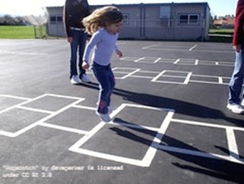 Child playing hopscotch