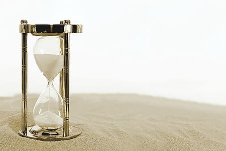 Hourglass in sand