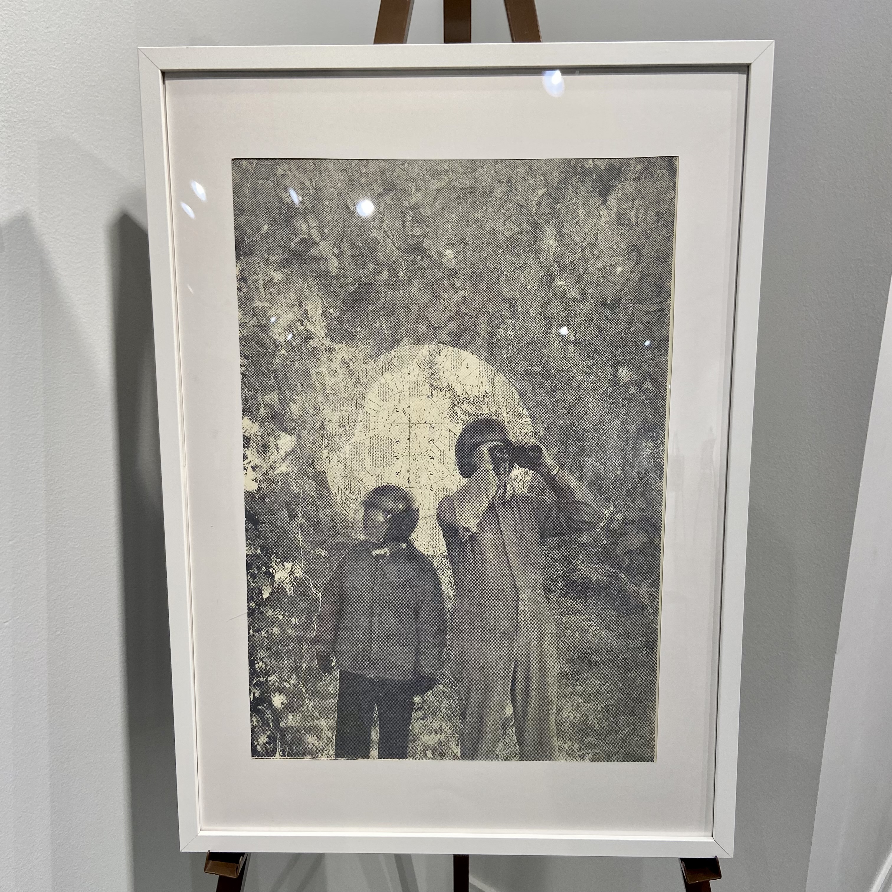 Mixed media image of an adult with binoculars and child with a helmet