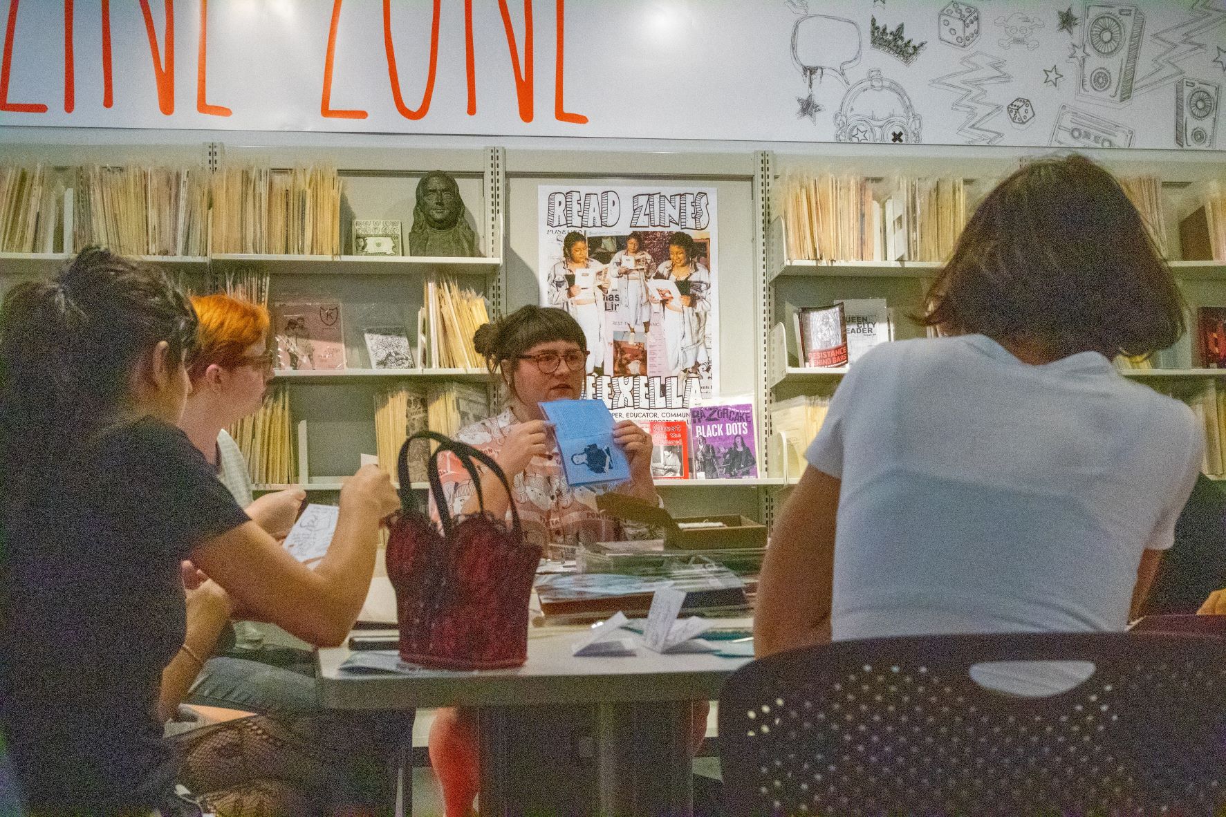 Zinesters meeting in the library's Zine Zone