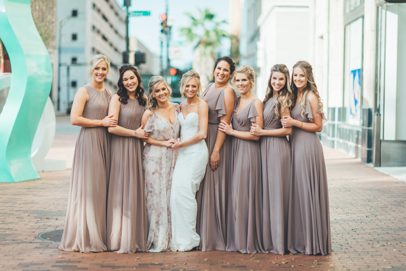 bride and her maids of honor in front of the Main Library