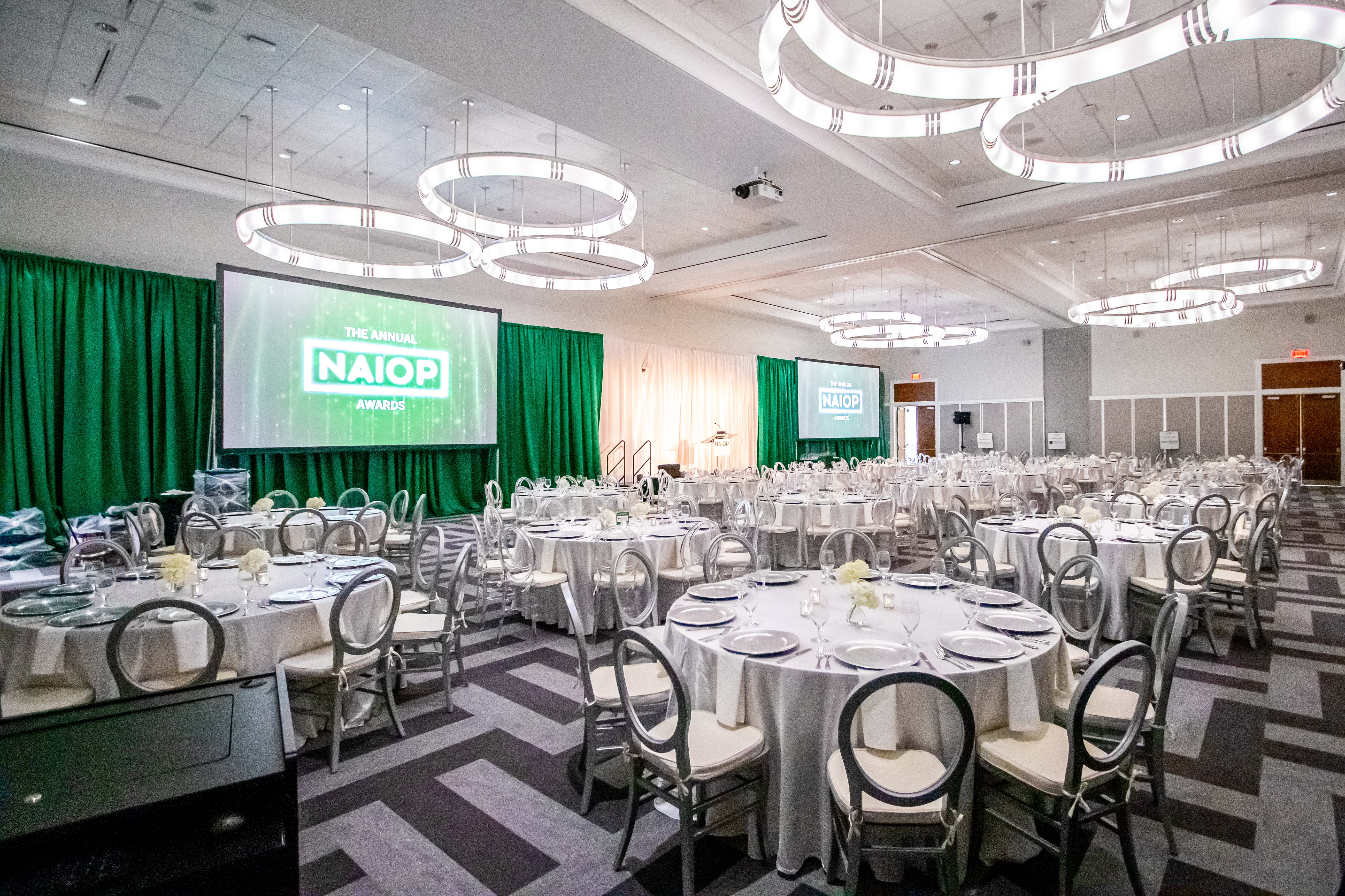 photo of tables and chairs set up for a conference