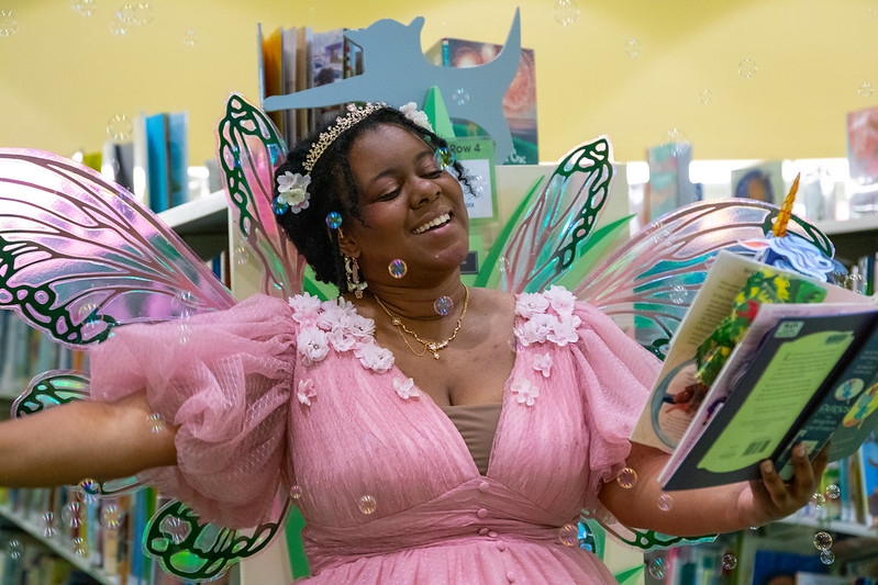 Jasmine the Book Fairy holding a book