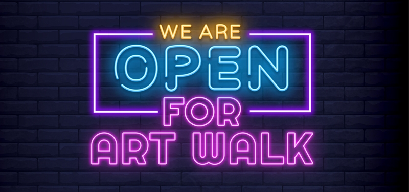 'We are open for Art Walk' in neon lights on a dark background