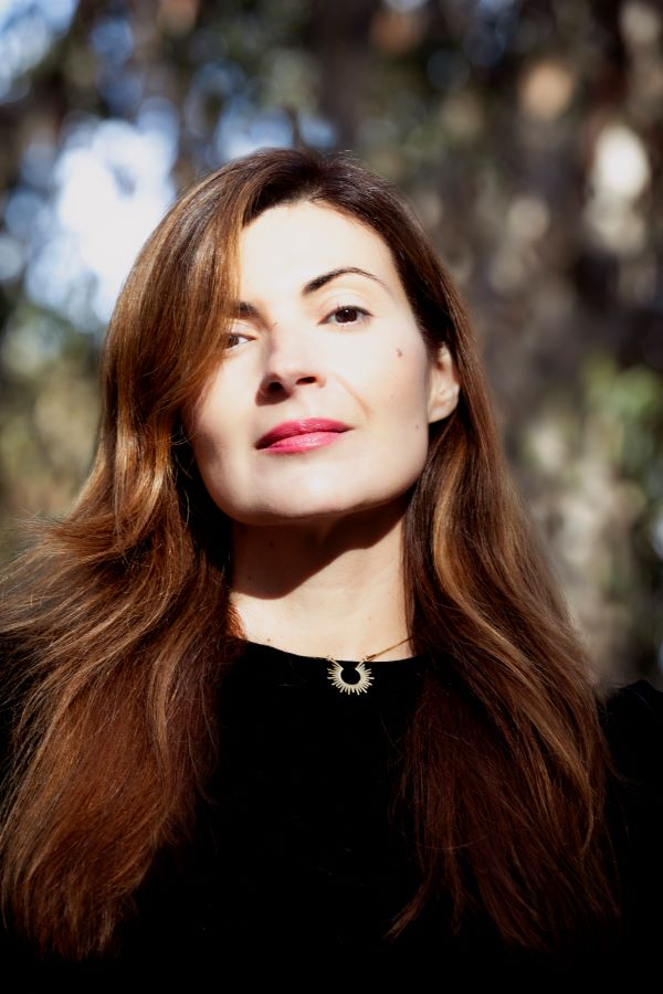 Headshot photo of author Mona Awad