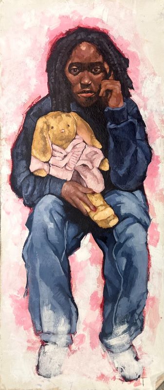 A child holding a stuffed rabbit