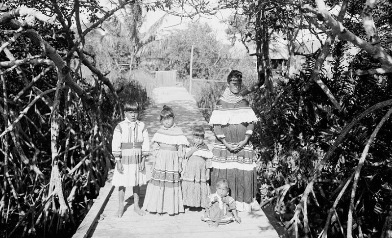 Photo of Black Seminoles on a wooded path