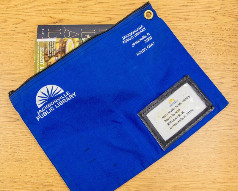 Books by Mail reusable nylon bag, with address card showing