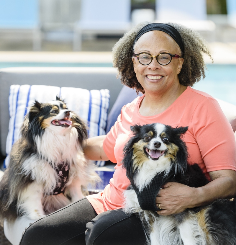 Photo of Jewell Parker Rhodes with her dogs
