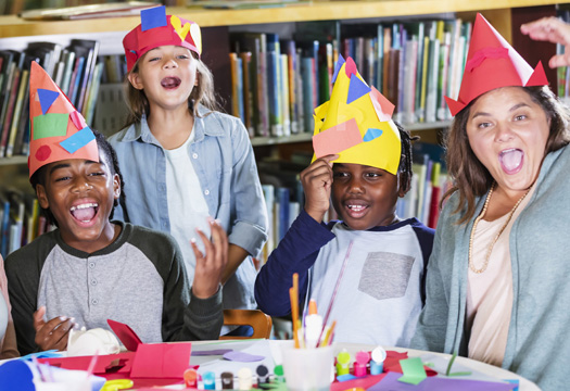 Library visits to your classroom kids with hats in a classroom