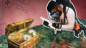 A diver with a treasure chest