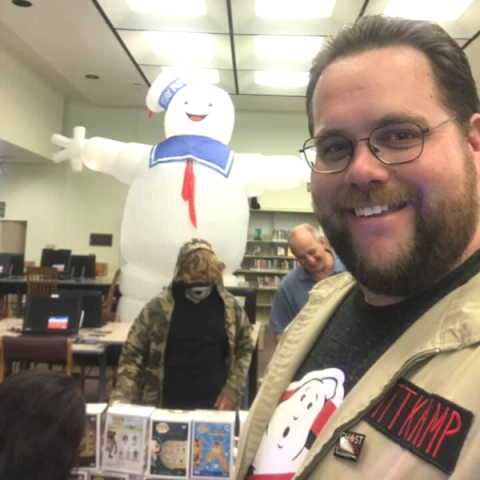 One of the members of the Ghostbusters of Middleburg by an inflatable marshmallow man