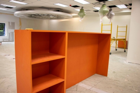 Cabinets painted orange in the Highlands Regional Library Children's area
