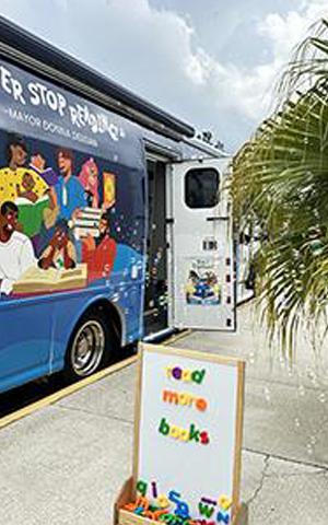 Bookmobile parked at a location to give out books