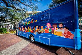 driver's side, rear quarter view of the bookmobile