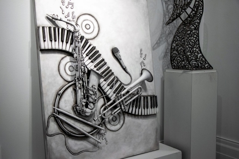 Mixed media piece incorporating instruments and music notes
