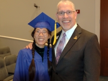 Lianying Ye gets a big congratulations from Library Director Tim Rogers at the Jacksonville Public Library