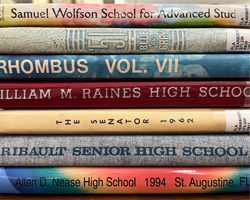 Yearbook Collection photo of the spines of a stack of yearbooks